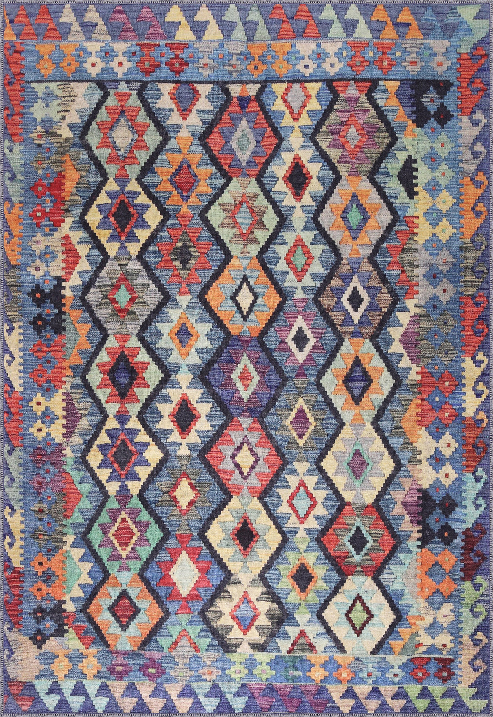 Colorful Kilim tribal geometric washable rug by Netline Home with chenille texture and non-slip cotton backing.