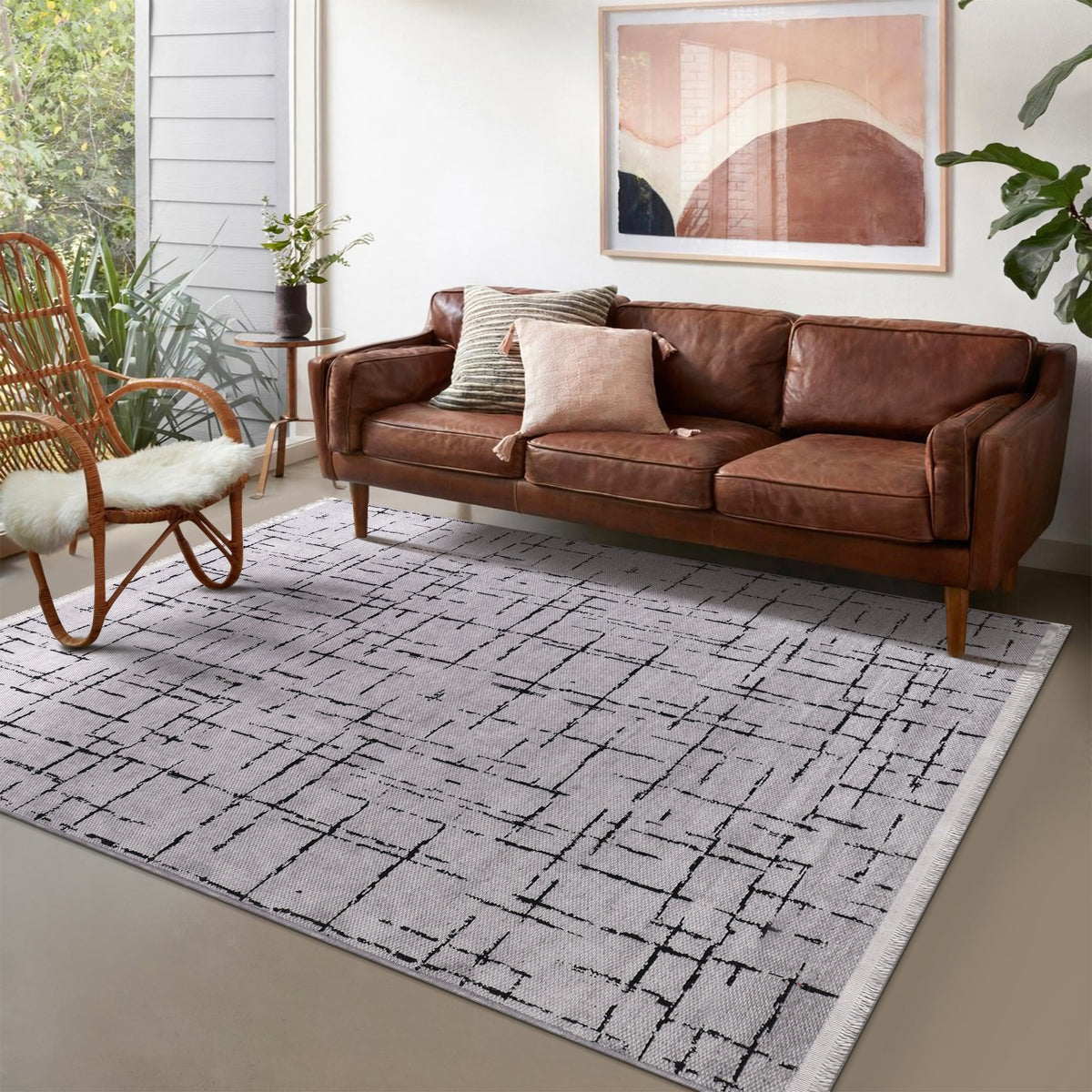 Gray machine washable rug by Netline Home featuring soft chenille texture, perfect for easy cleaning and cozy decor.