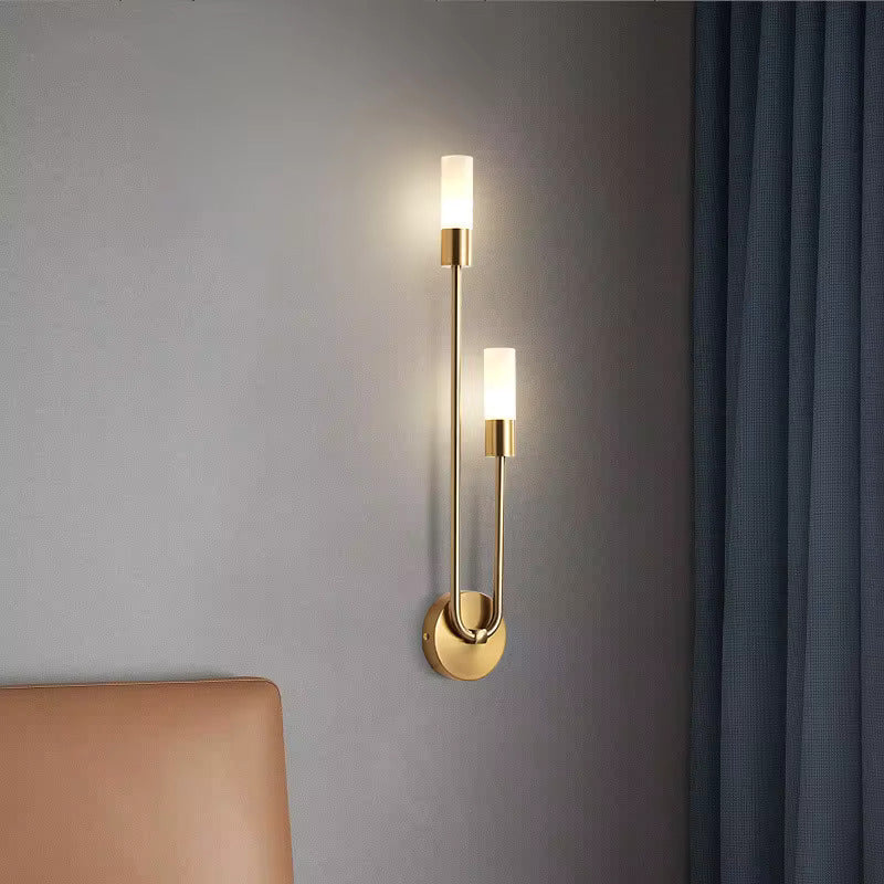 Spire Sleek LED Wall Light 12W Warm White by Light My House, modern metal design with G9 bulb, mounted on wall.