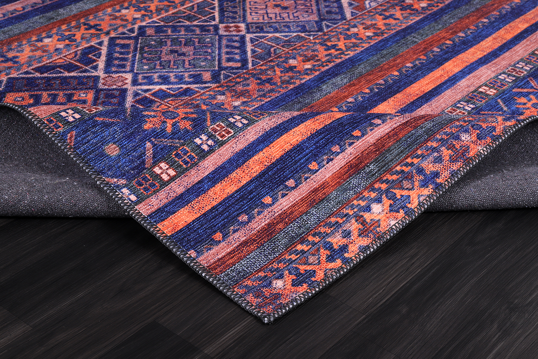 Modern purple floral washable rug by Netline Home with vibrant floral pattern on soft fabric, ideal for home decor.