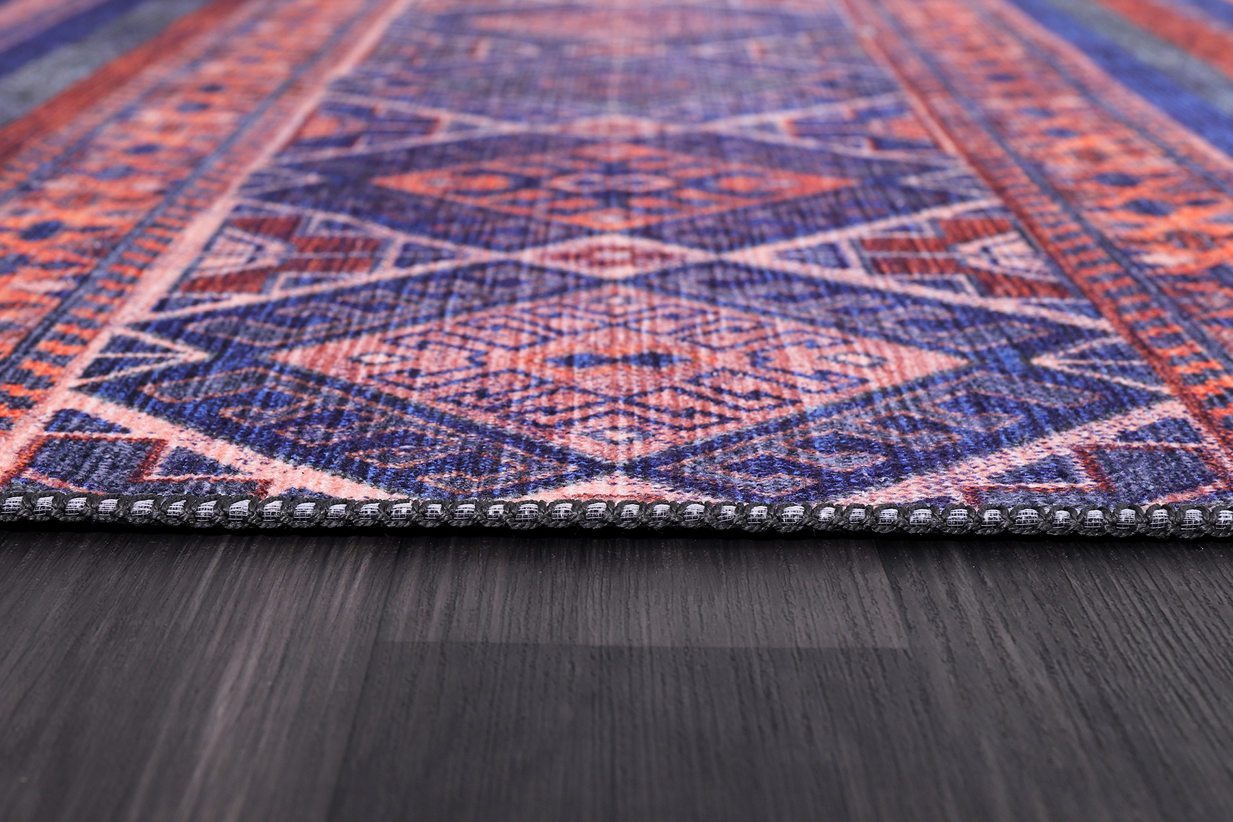 Modern purple floral washable rug by Netline Home featuring a vibrant floral design on a soft, durable fabric background.