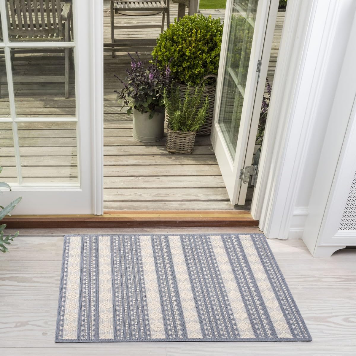Grey washable cotton area rug by Netline Home, vintage boho design, non-slip, pet and kid friendly for living room or bedroom.