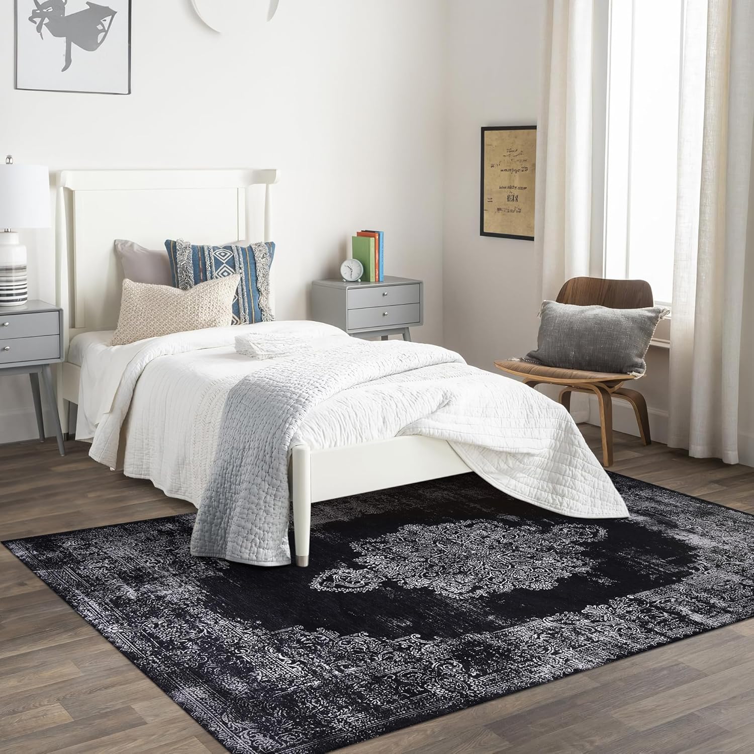 Black and gray medallion washable rug by Netline Home featuring intricate geometric patterns and durable fabric.