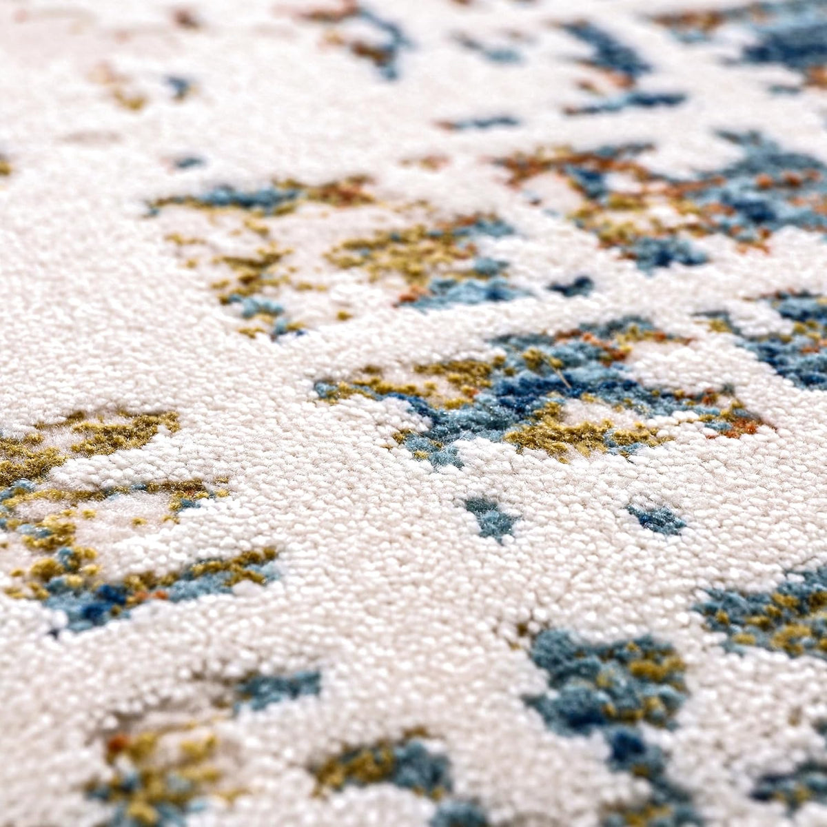Soft beige and blue bohemian-style area rug for living room, bedroom, or hallway, featuring low pile and contemporary design.