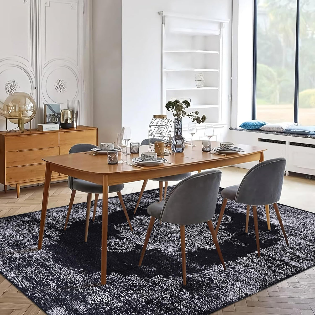 Black and gray medallion washable rug by Netline Home featuring intricate traditional design, perfect for living rooms or bedrooms.