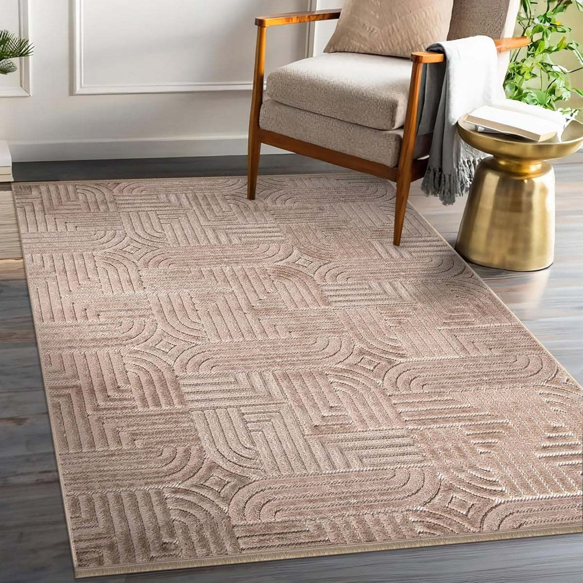 Modern textured polypropylene area rug in taupe with geometric pattern, suitable for living room, bedroom, or dining space.