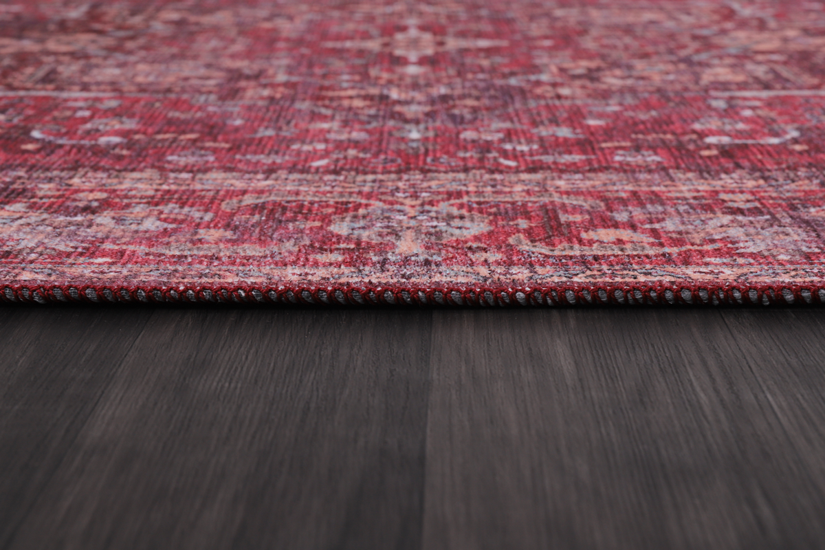 Multicolor geometric washable rug by Netline Home featuring tribal patterns in vibrant shades, perfect for modern interiors.
