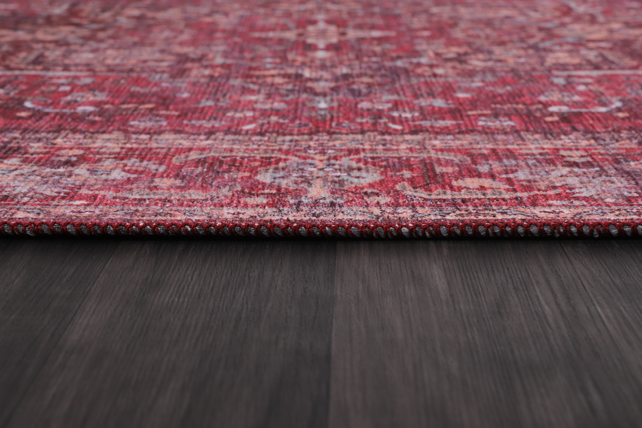Multicolor geometric washable rug by Netline Home featuring tribal patterns in vibrant shades, perfect for modern interiors.