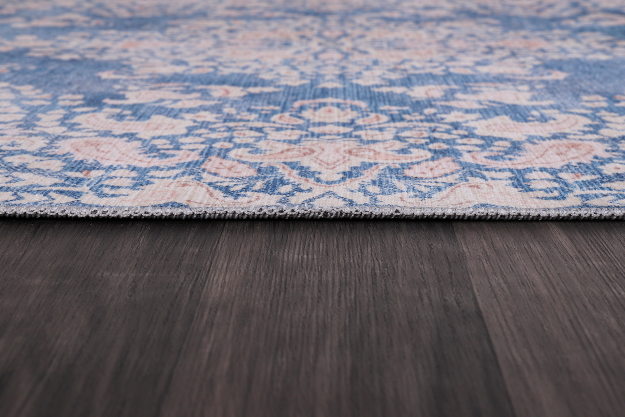 Modern beige floral washable rug by Netline Home with intricate floral pattern, durable and easy to clean.