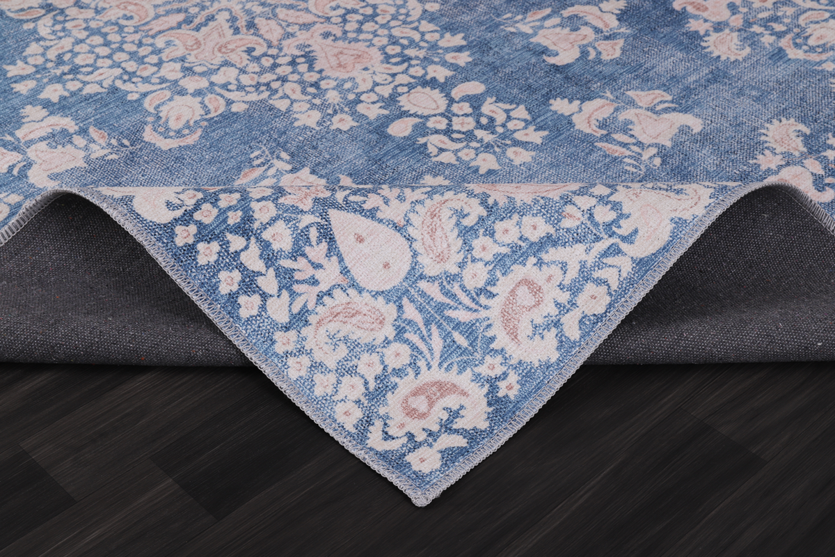 Modern beige floral washable rug from Netline Home showing a detailed floral design on a light background.