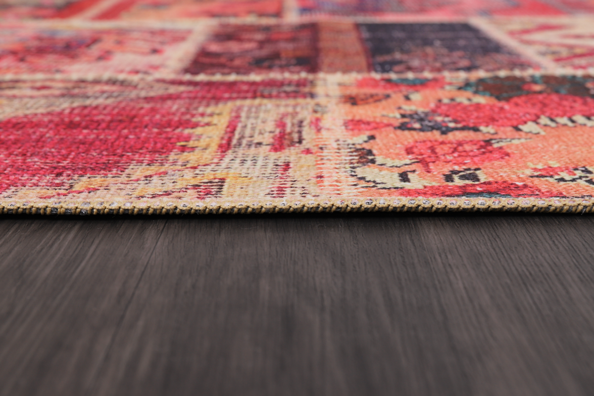 Red kilim washable rug with medallion patchwork design by Netline Home, featuring intricate patterns and vibrant colors.