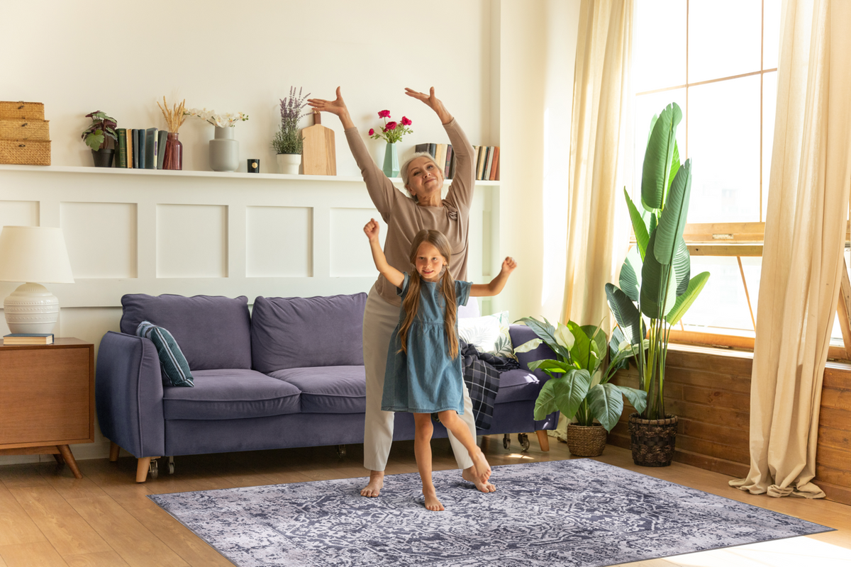 Blue abstract washable rug by Netline Home featuring a traditional design with intricate patterns and vibrant colors.