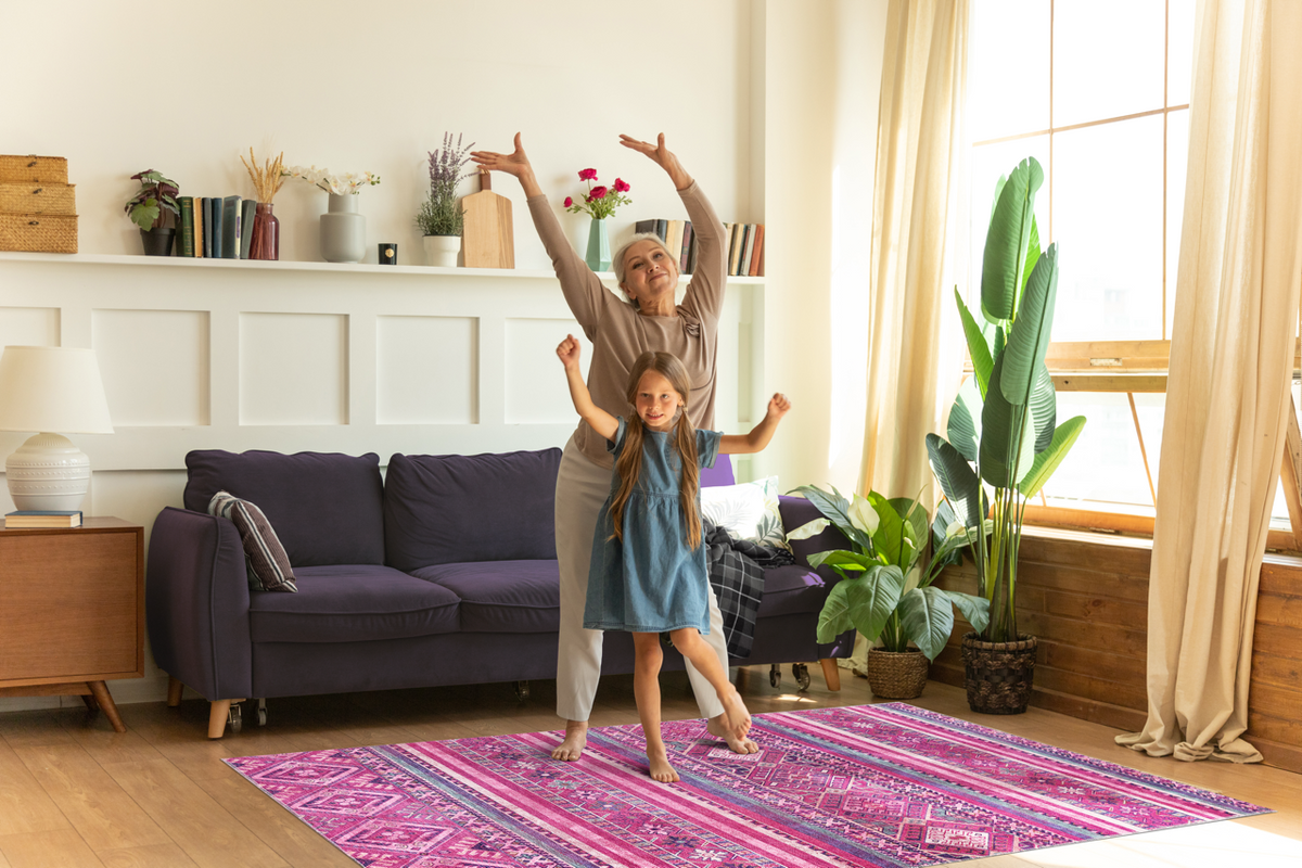 Bohemian pink striped washable rug by Netline Home with vibrant pink and white stripes, showing the full design and texture.