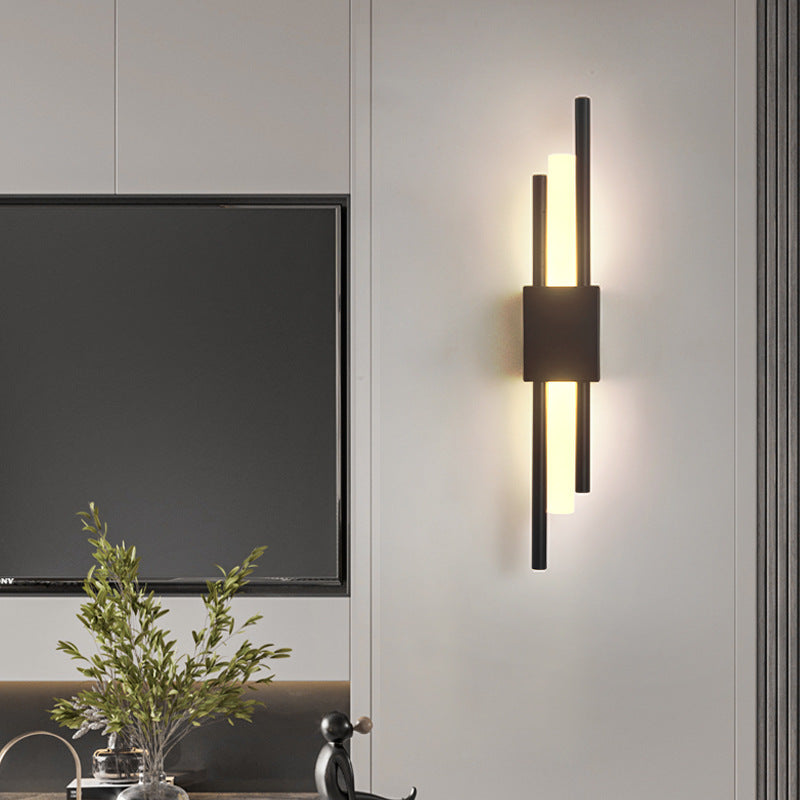 Modern black and gold Emporium LED wall lamp with warm light, hard-wired design by Light My House, ideal for contemporary interiors.