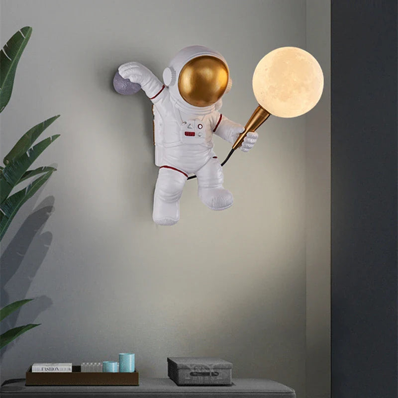 Astronaut LED wall light featuring a moon globe design, suitable for kids' bedrooms, by Light My House.