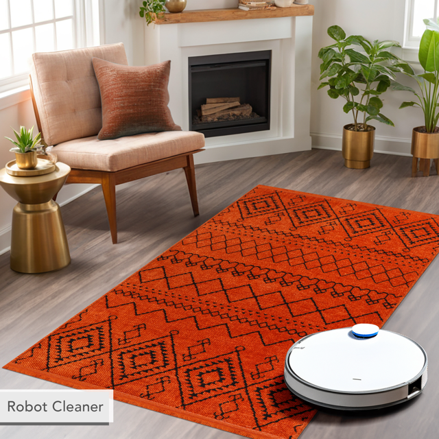 Soft orange washable chenille rug from Netline Home, machine washable and comfortable for living spaces.