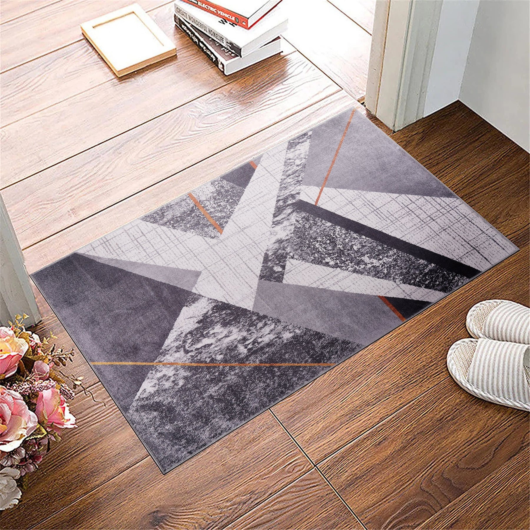 Gray striped washable rug by Netline Home with bohemian design, featuring soft fabric and a stylish, modern pattern.
