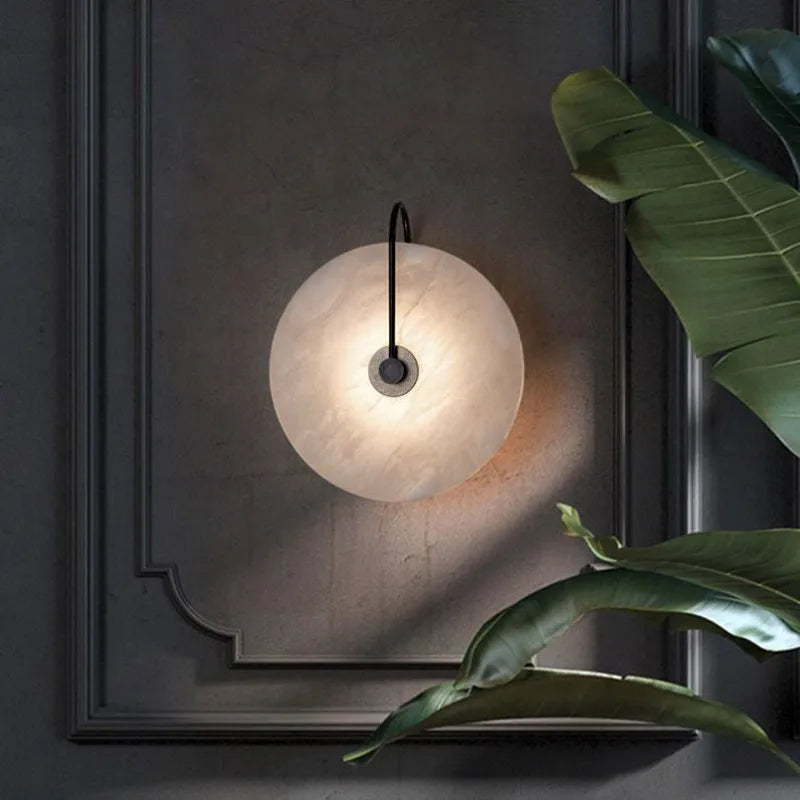 Modern marble wall lamp with disc texture and warm LED lighting, ideal for contemporary home decor by Light My House