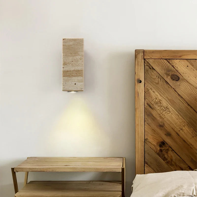 Travertine wall light by Light My House, waterproof indoor-outdoor beige and brown sconce with a stylish, rustic design.