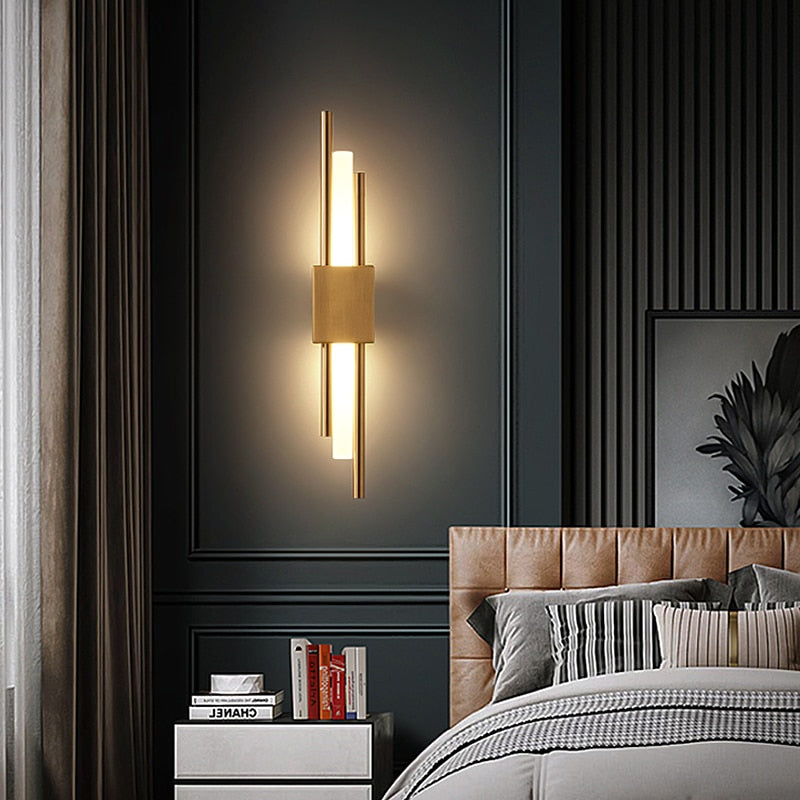 Modern black and gold LED wall lamp by Light My House, featuring warm light and a sleek, hard-wired design for stylish interior lighting.