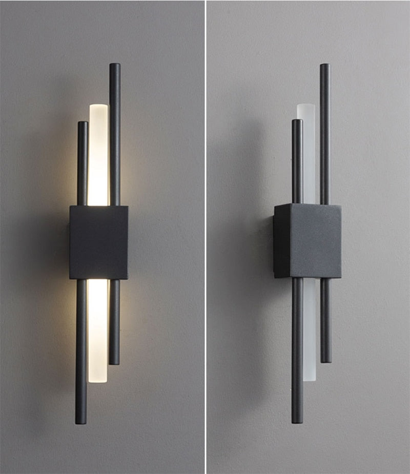 Modern black and gold LED wall lamp by Light My House with warm light, hardwired installation, ideal for contemporary decor.