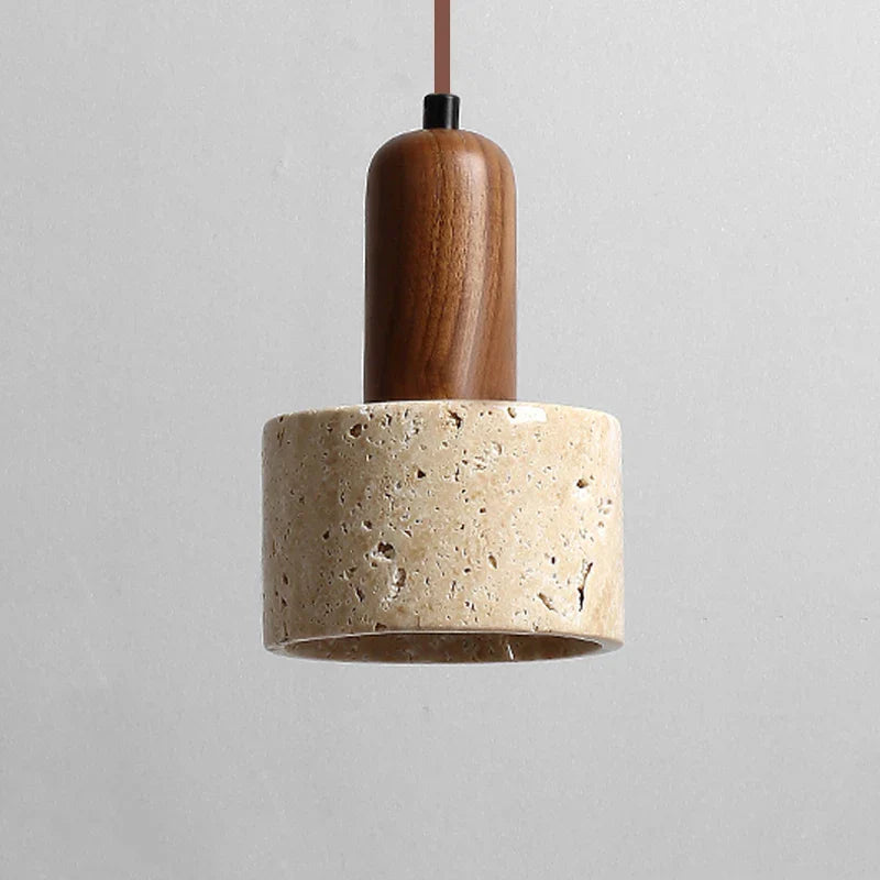 Beige and brown travertine pendant light by Light My House hanging above a kitchen island ceiling fixture.