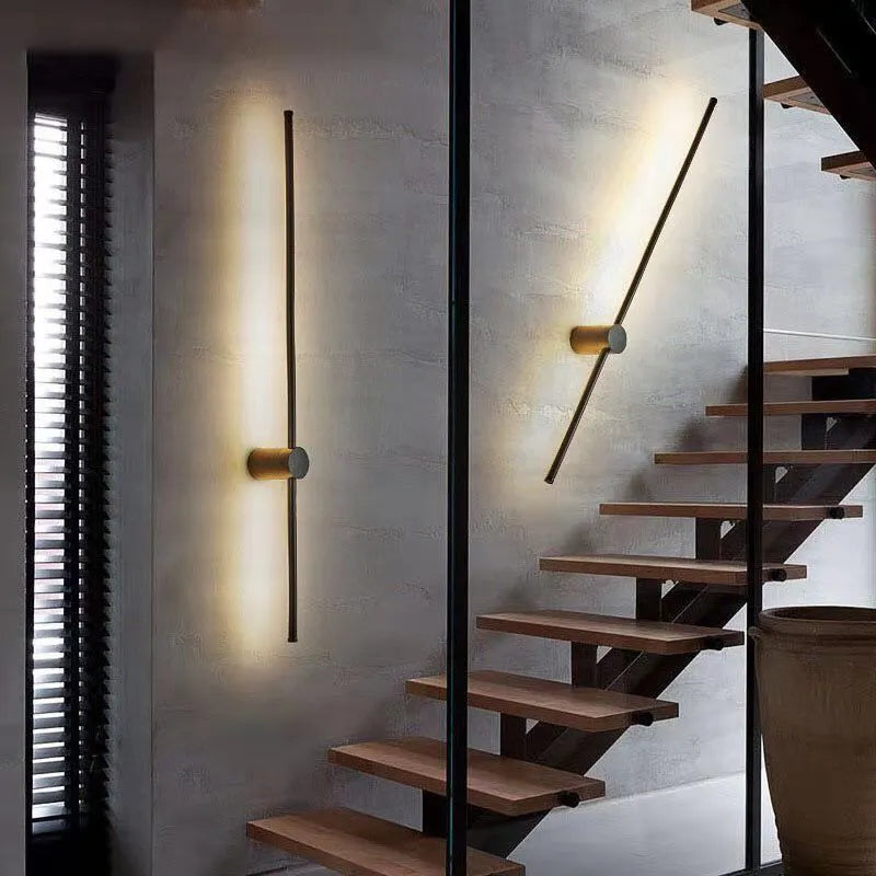 Black LED wall light by Light My House, modern warm bedroom lounge lamp mounted on a wall with easy installation.