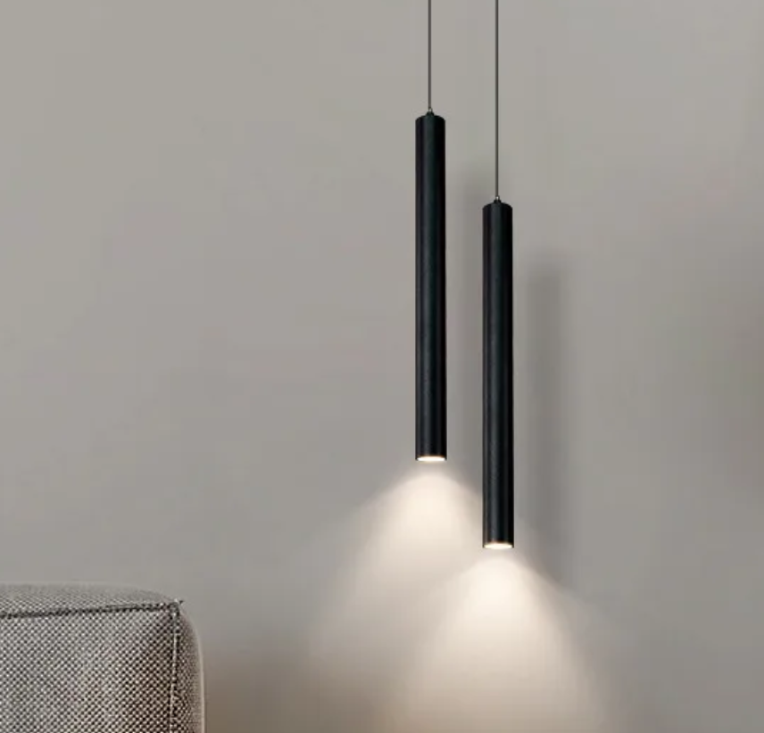 Black pendant light by Light My House featuring an adjustable minimal design for bedroom lighting.