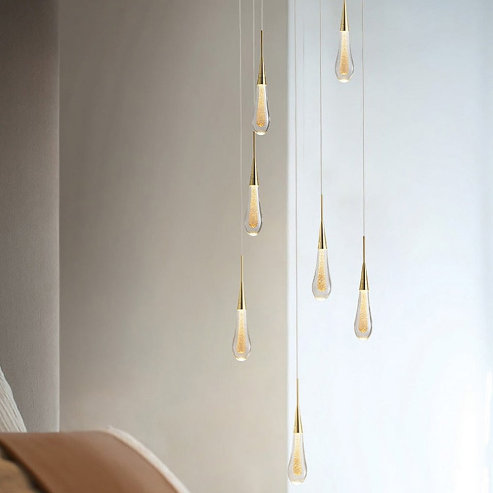 Glass drop pendant light by Light My House with warm LED bulb, hanging from a string fixture, ideal for modern interior lighting.