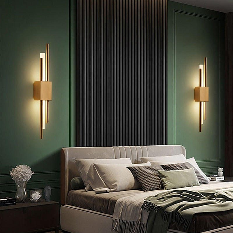 Modern black and gold LED wall lamp by Light My House with warm light, hardwired installation, ideal for contemporary interior decor.