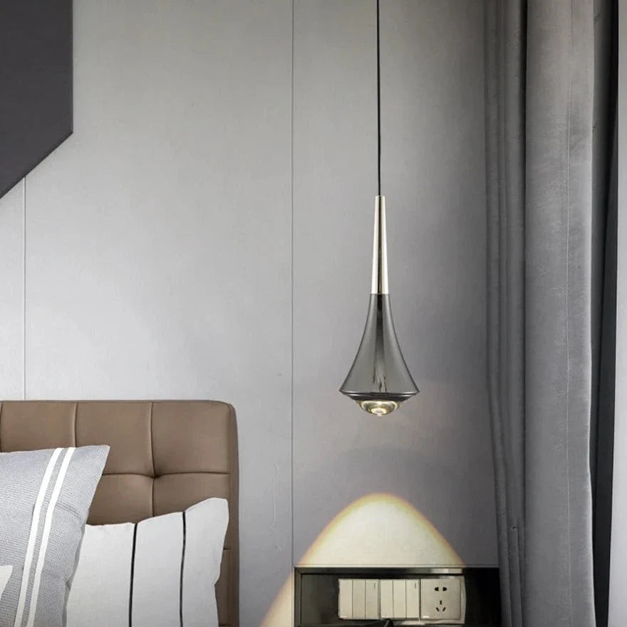 Adjustable LED dropping pendant light with warm glow from Light My House, featuring sleek design and integrated lighting.