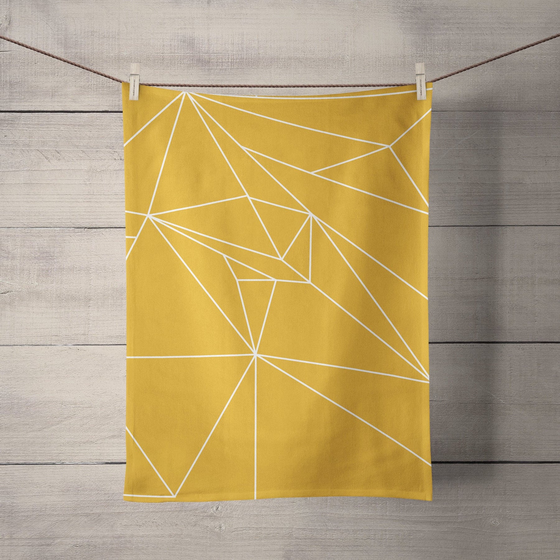 Yellow Tea Towel with a White Geometric Line Design