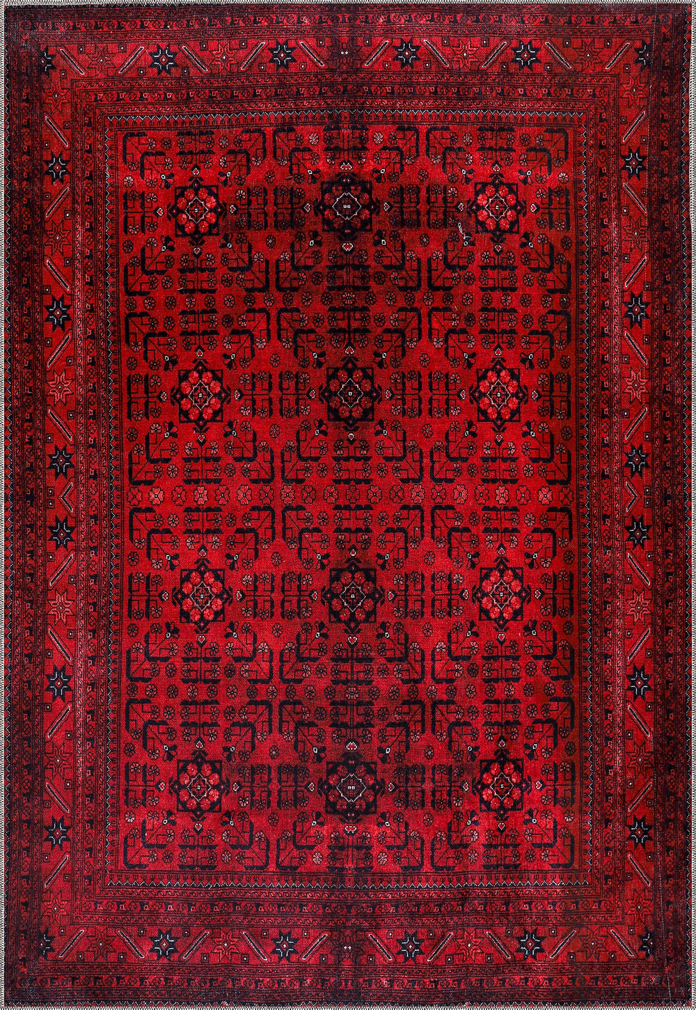 Top view of Netline Home washable red Afghan pattern area rug with traditional geometric design for living room, bedroom, or office.