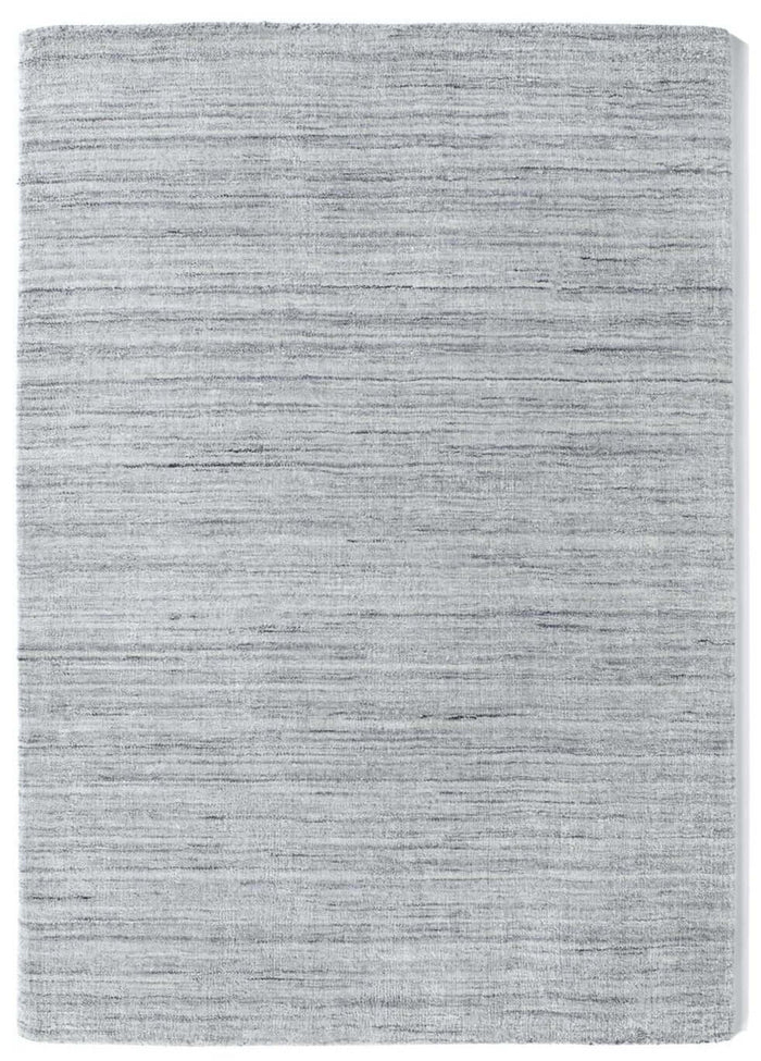 Fine Stripes Silver Grey Wool Rug shown in an illustrative room