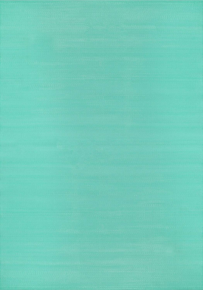 Urban Outdoor Rug Turquoise – 1000 shown in an illustrative room