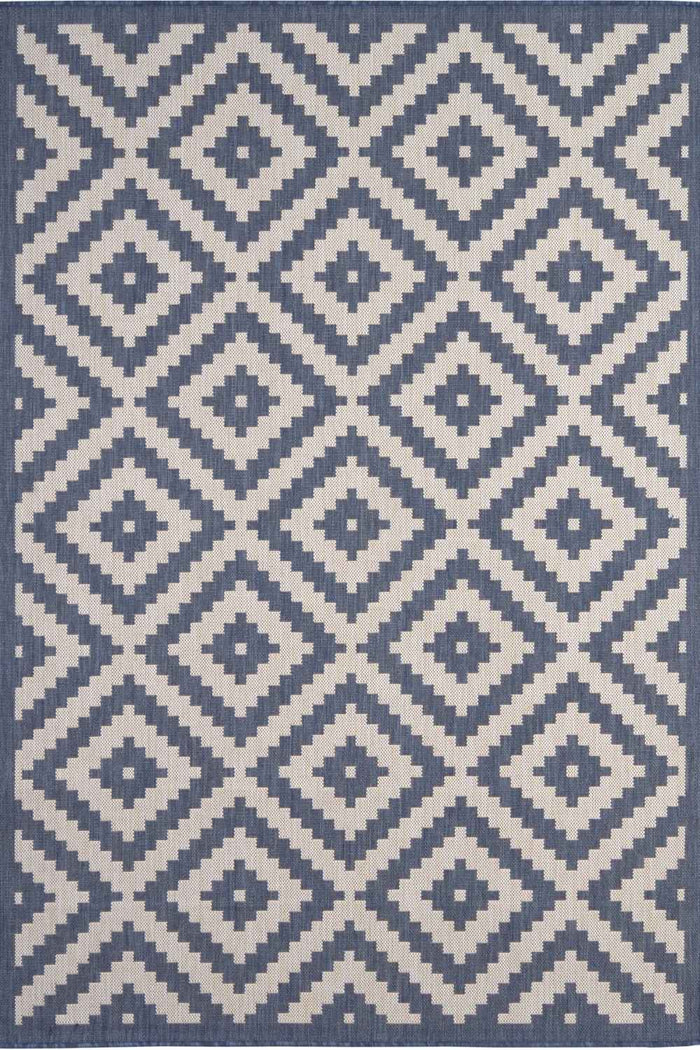 Ecology Outdoor Rug Blue – 100blu shown in an illustrative room