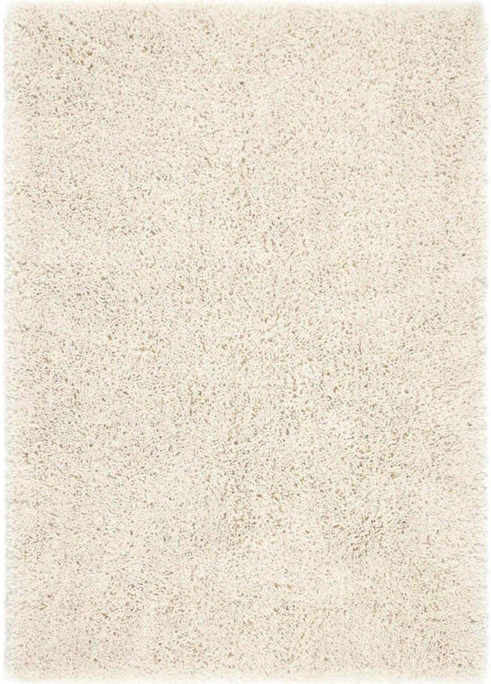 Chicago Cream Shaggy Rug shown in an illustrative room