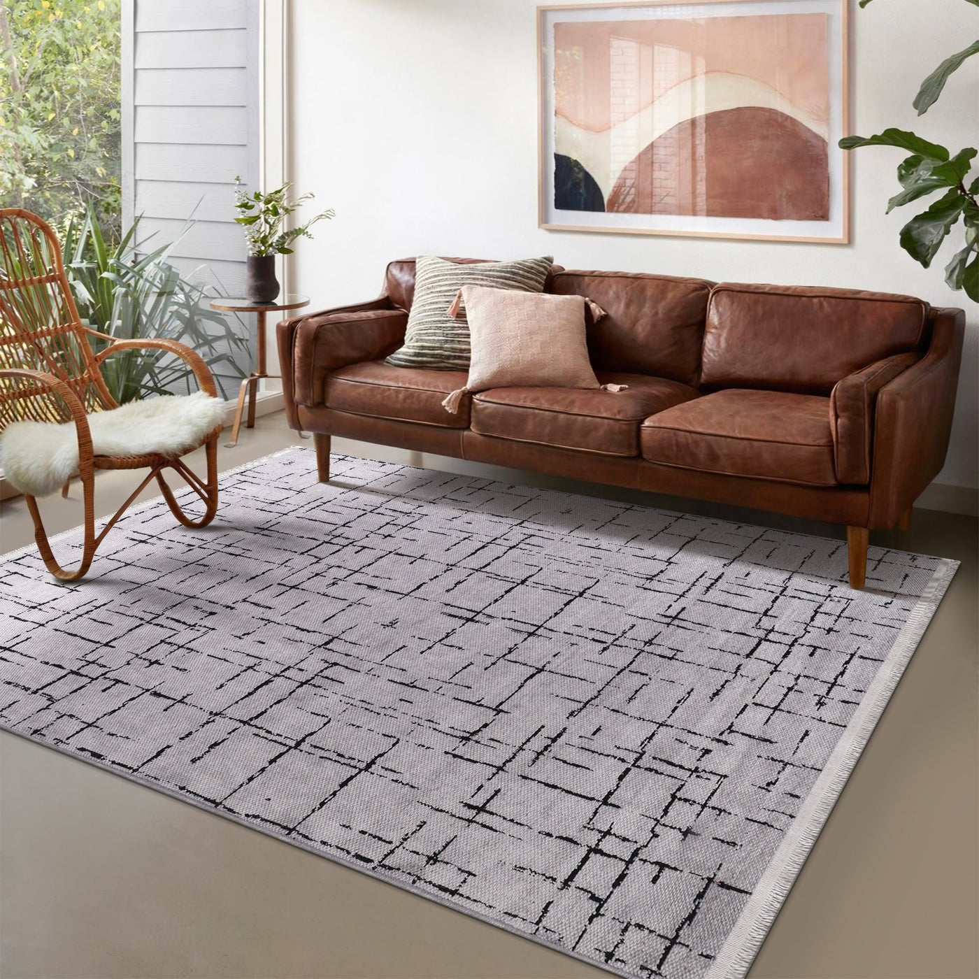 Gray machine washable rug by Netline Home featuring soft chenille texture, perfect for easy cleaning and cozy decor.