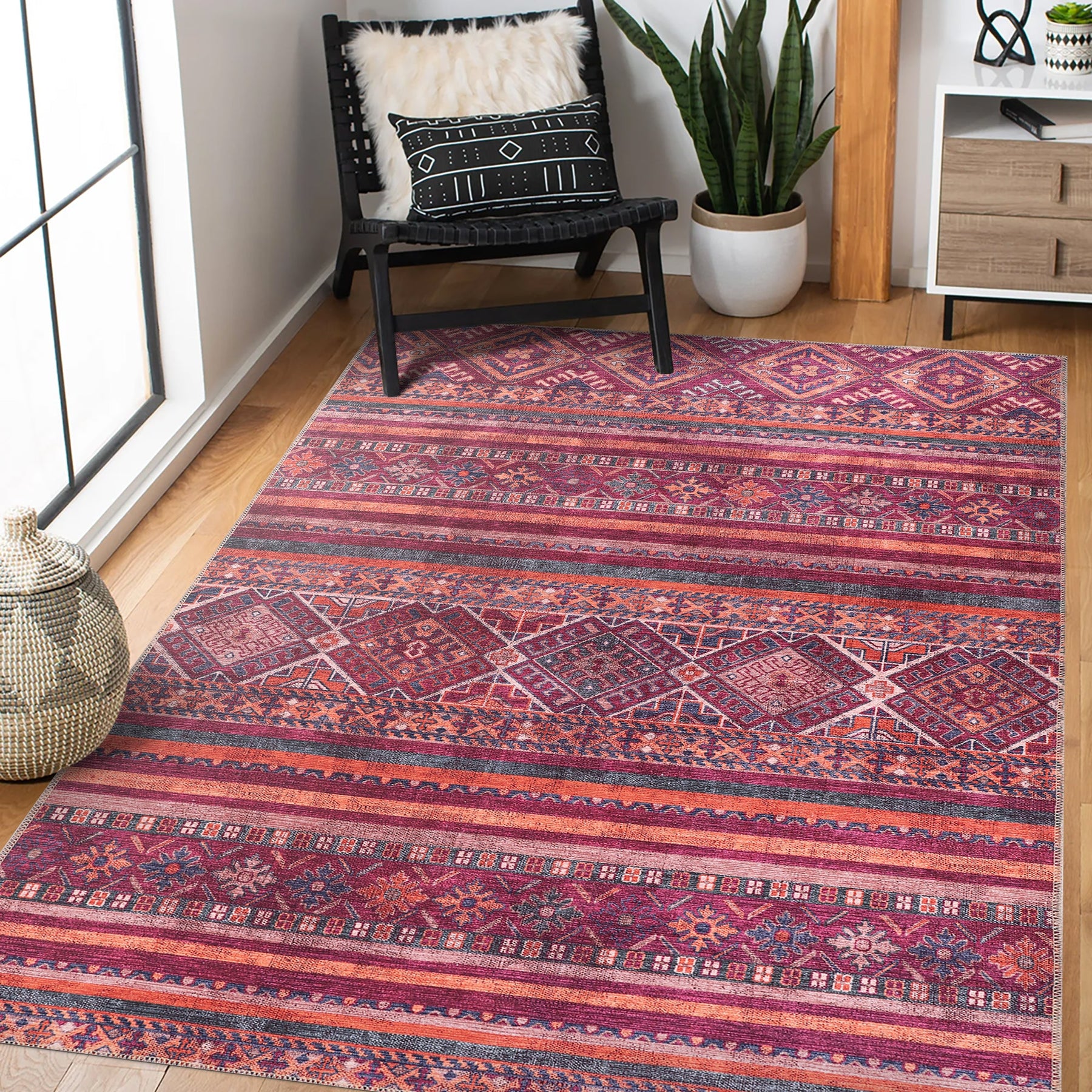 Colorful tribal geometric washable rug by Netline Home with vibrant multicolor patterns, perfect for modern interior decor.