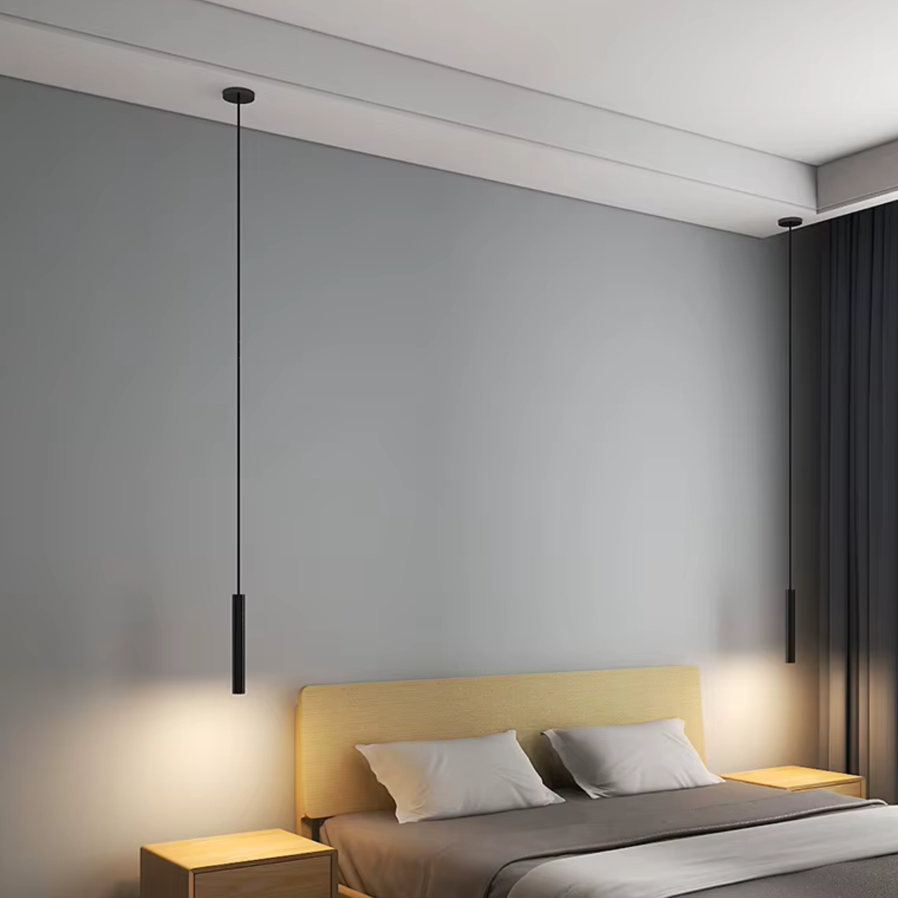 Adjustable black pendant light from Light My House hanging in a modern bedroom for minimal, ambient lighting.