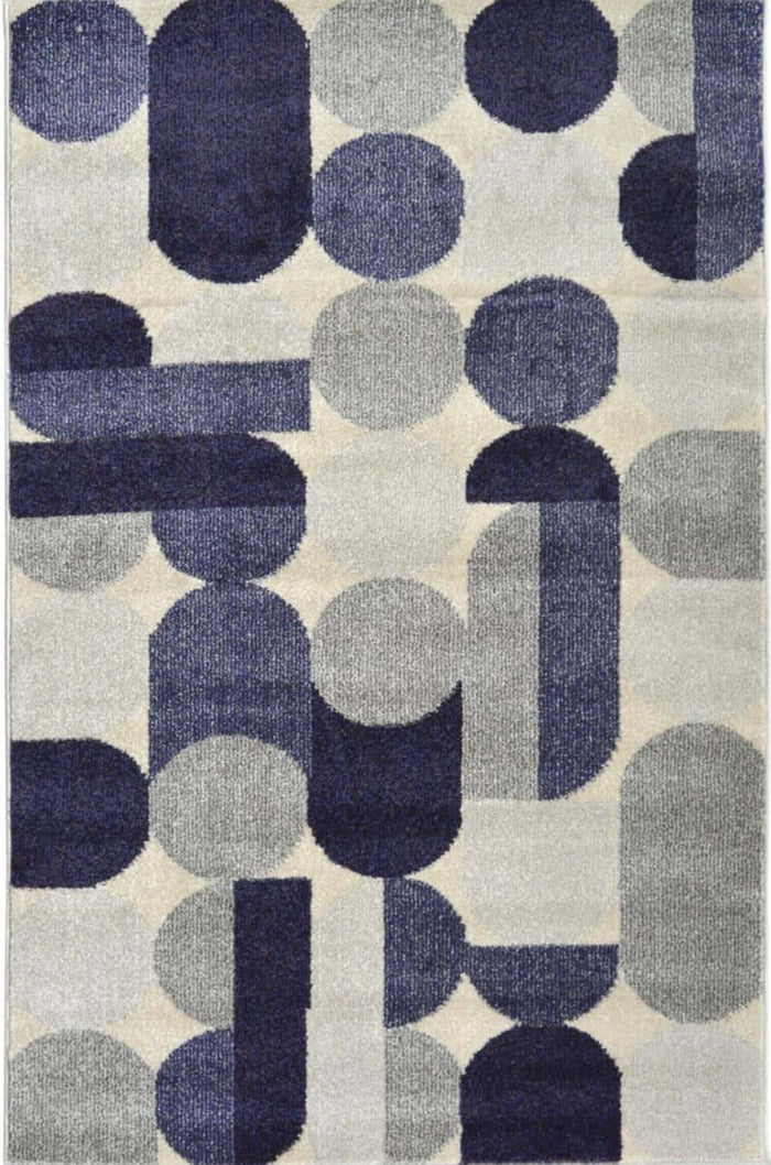 Villa Blue Abstract Rug shown in an illustrative room