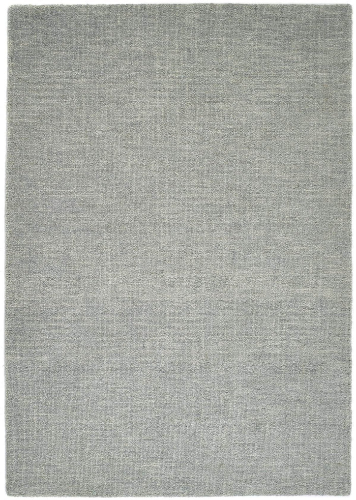 Country Sea Mist Solid Wool Rug shown in an illustrative room