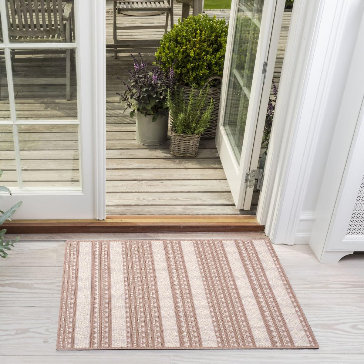 Grey washable cotton area rug from Netline Home, vintage boho style, non-slip, pet and kid friendly, ideal for living room or bedroom.