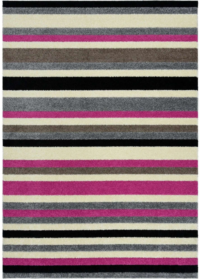 Linea Striped Pink Washable Rug shown in an illustrative room
