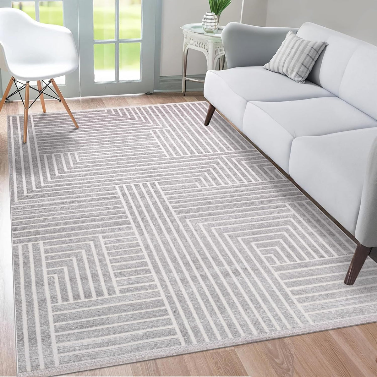 Soft plush light gray area rug by Netline Home, modern non-shedding carpet for living room, bedroom, hallway, or office.