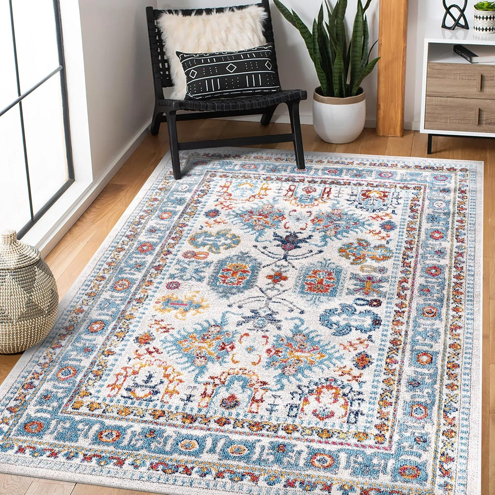 Cream and blue oriental rug from Netline Home, medium pile, vintage design, stain-resistant rug for living room or bedroom.
