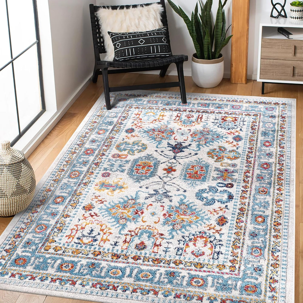 Cream and blue oriental rug from Netline Home, medium pile, vintage design, stain-resistant rug for living room or bedroom.