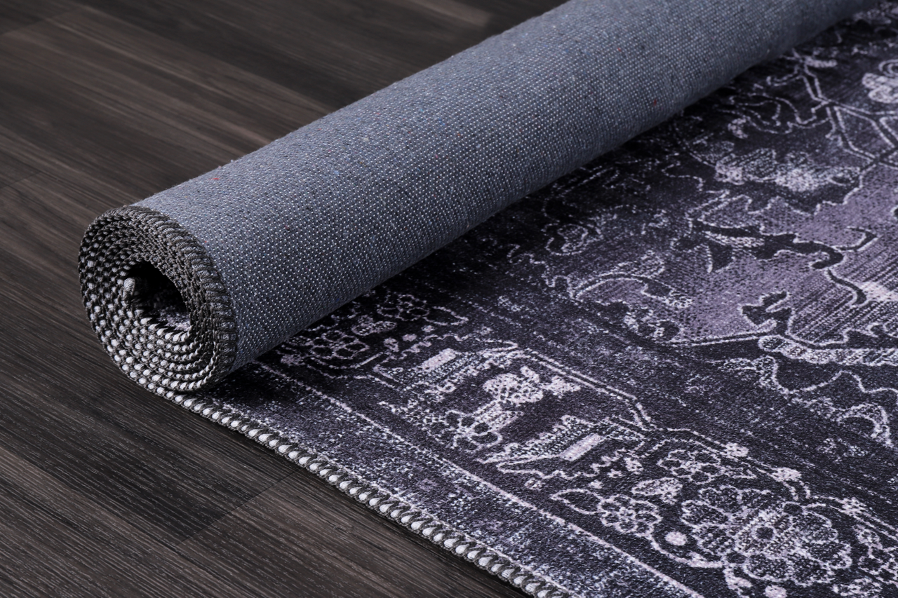 Black geometric medallion washable rug by Netline Home with tribal design, featuring bold patterns and a soft, durable surface.
