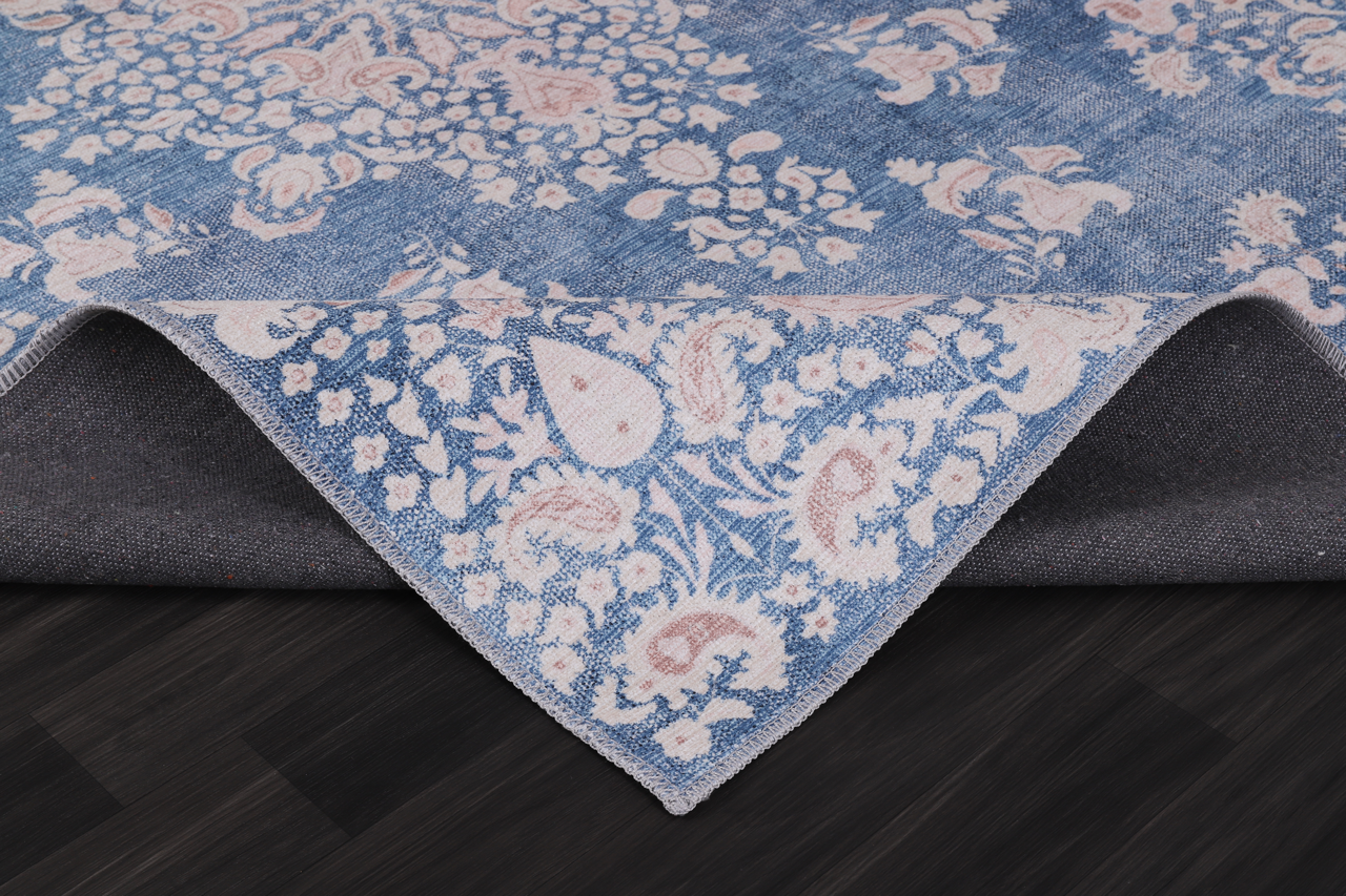 Modern beige floral washable rug from Netline Home showing a detailed floral design on a light background.