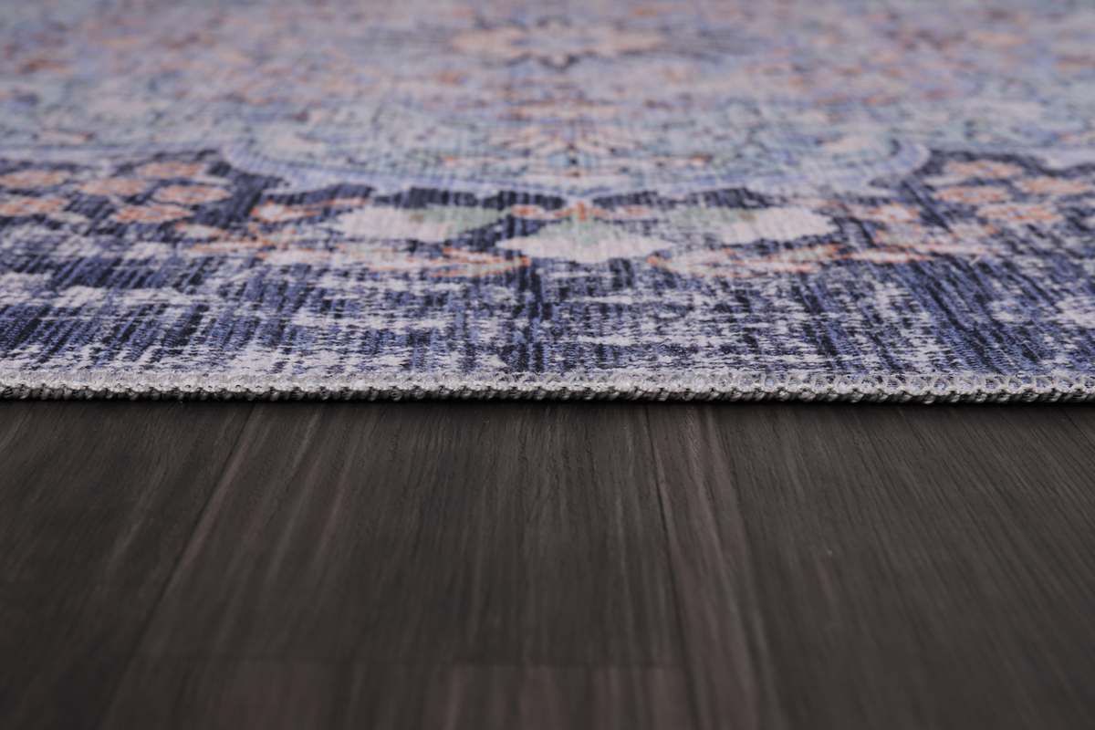 Traditional blue abstract medallion washable rug by Netline Home featuring intricate design and vibrant colors.